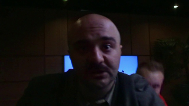 Video Reference: Forehead, Cheek, Ear, Jaw, Flash photography, Beard, T-shirt, Space, Electric blue, Midnight
