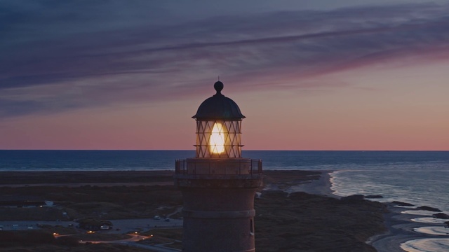 Video Reference: Lighthouse, Water, Cloud, Sky, Tower, Afterglow, Building, Street light, Dusk, Beacon