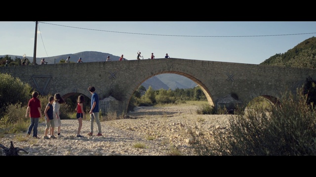 Video Reference: Sky, Plant, Natural landscape, Grass, Landscape, Travel, Tree, Grassland, Bridge, Recreation