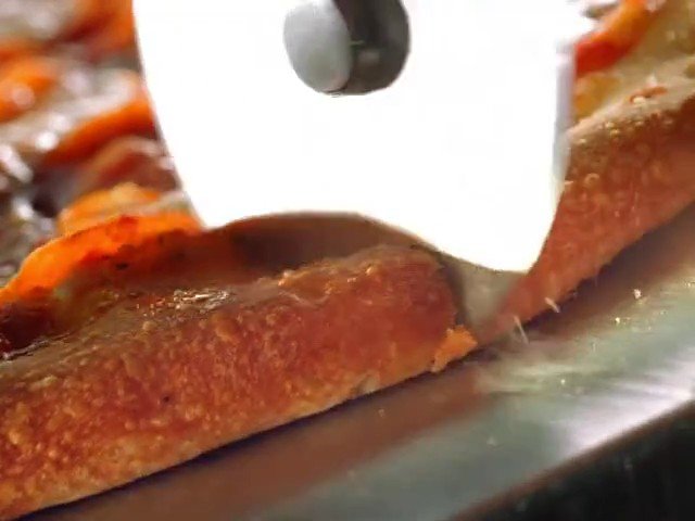 Video Reference: food, slicing, cutting, machine, close-up, industrial, conveyor, cooked, meat, production, processing, kitchen, manufacturing