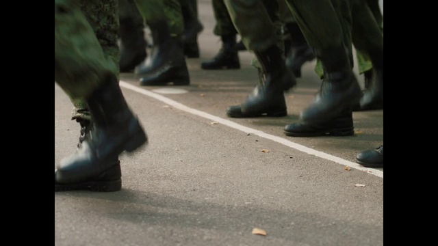 Video Reference: Shoe, Leg, Black, Road surface, Asphalt, Gesture, Grey, Flooring, Thigh, Street fashion