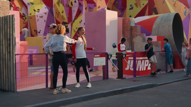 Video Reference: Art, Pink, Leisure, Wall, Recreation, Fun, Facade, Event, Visual arts, Magenta