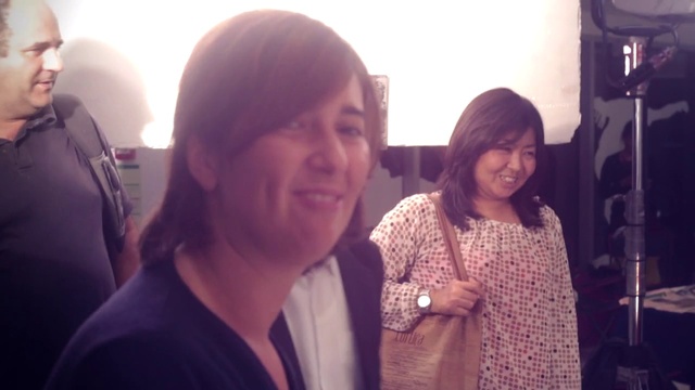 Video Reference: Smile, Gesture, Happy, Cool, Fun, Eyewear, Event, T-shirt, Magenta, Conversation