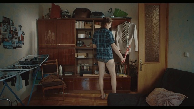 Video Reference: Cabinetry, Furniture, Hat, Fedora, Shelf, Interior design, Bookcase, Wood, Sun hat, Table