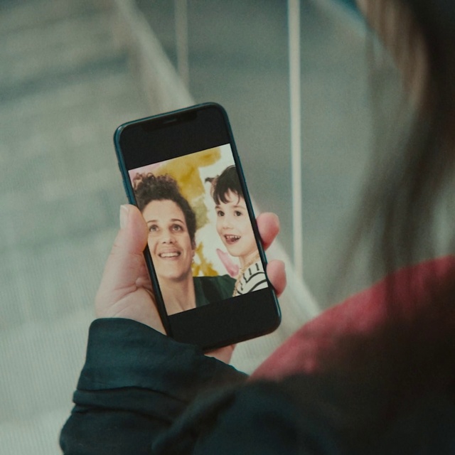 Video Reference: Smile, Hand, Mobile phone, Communication Device, Telephony, Mobile device, Gesture, Portable communications device, Thumb, Gadget