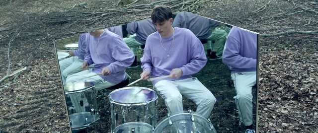 Video Reference: Membranophone, Trousers, Drum, Musical instrument, Idiophone, Drumhead, Tom-tom drum, Grass, Cymbal, Drum stick