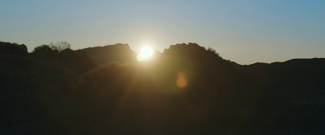 Video Reference: Sky, Atmosphere, Mountain, Sunlight, Highland, Sunrise, Natural landscape, Sunset, Afterglow, Landscape