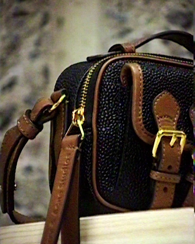 Video Reference: Product, Luggage and bags, Sleeve, Bag, Street fashion, Shoulder bag, Eyewear, Travel, Wood, Metal