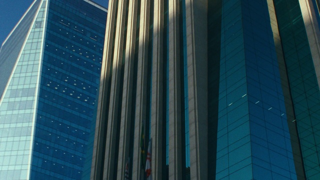 Video Reference: Building, Skyscraper, Azure, Tower block, Commercial building, Glass, Facade, Tints and shades, Condominium, City