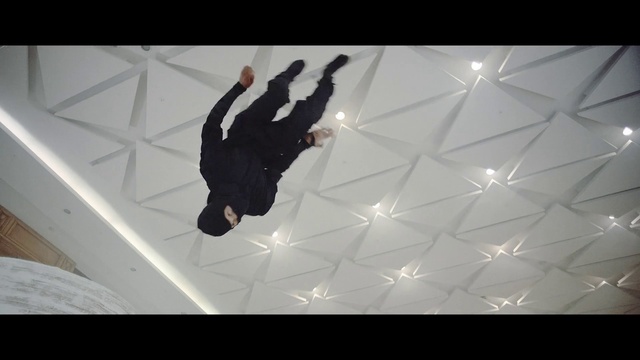 Video Reference: Entertainment, Font, Performing arts, Ceiling, Stunt performer, Space, Event, Stunt, Fun, Shadow