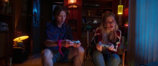 Video Reference: Facial expression, Leg, Musician, Thigh, Tableware, Guitar, Leisure, Fun, Chair, Event