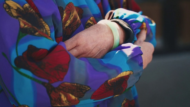 Video Reference: Blue, Textile, Gesture, Art, Sportswear, Electric blue, Nail, Magenta, Wrist, Pattern