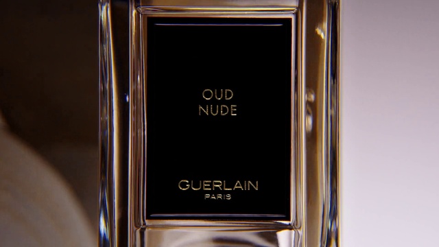 Video Reference: Rectangle, Fluid, Liquid, Gold, Perfume, Font, Electric blue, Communication Device, Metal, Glass