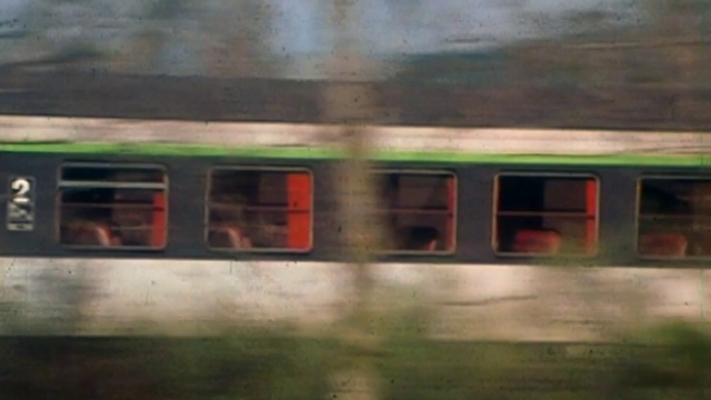 Video Reference: Train, Vehicle, Automotive lighting, Paint, Motor vehicle, Rectangle, Rolling stock, Automotive exterior, Railway, Railroad car