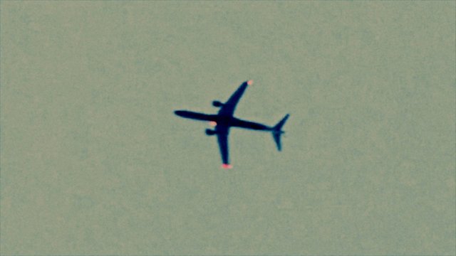 Video Reference: airplane, plane, aircraft, sky, silhouette, aviation, flight, transportation, travel, view from below, isolated, outdoor