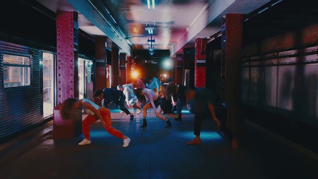 Video Reference: Building, Shorts, Entertainment, Performing arts, Leisure, Exercise, Event, Magenta, Physical fitness, Electric blue