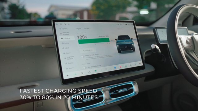 Video Reference: electric car, car interior, touchscreen, charging, dashboard, steering wheel, EV, infotainment, technology, modern vehicle, promo text, fast charging, vehicle interior, display, automation, clean design