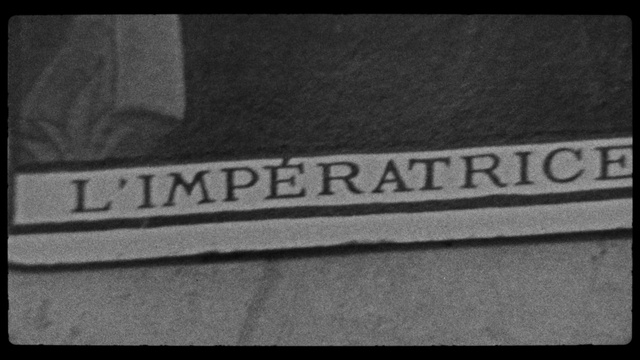 Video Reference: Grey, Font, Rectangle, Asphalt, Pattern, Monochrome, Brand, Electric blue, Monochrome photography, Number
