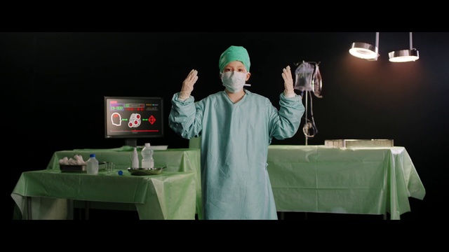 Video Reference: Table, Sleeve, Entertainment, Audio equipment, Performing arts, T-shirt, Event, Electronic device, Gadget, Technology