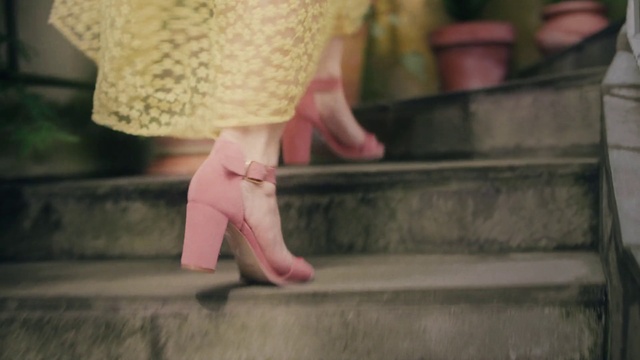 Video Reference: Human body, Standing, Knee, Thigh, Wood, Plant, Pink, Finger, Barefoot, Street fashion