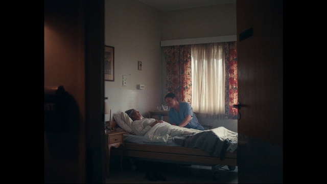 Video Reference: Comfort, Flash photography, Wood, Bed, Bed frame, Tints and shades, Curtain, Hardwood, Pillow, Linens