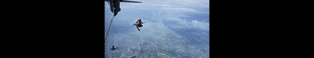 Video Reference: Cloud, Sky, Tandem skydiving, Rotorcraft, Helicopter, Water, Recreation, Air travel, Stunt performer, Extreme sport