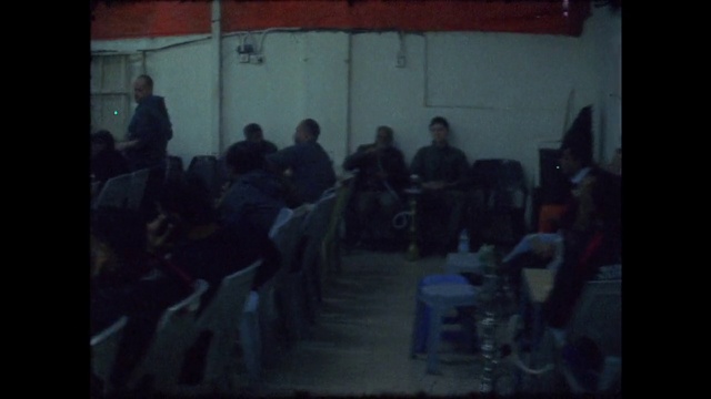 Video Reference: Tints and shades, Event, Chair, Art, Sitting, Room, Visual arts, Darkness, Audience, Crowd
