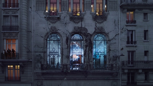 Video Reference: Window, Building, Purple, Lighting, Sky, City, Facade, Metropolitan area, Symmetry, Metropolis