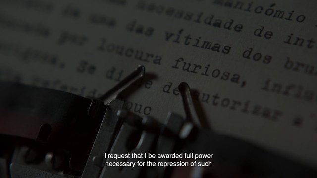 Video Reference: typewriter, close-up, printed text, document, typing, subtitles, low light, macro, paper, literature, editing, historical, dark scene