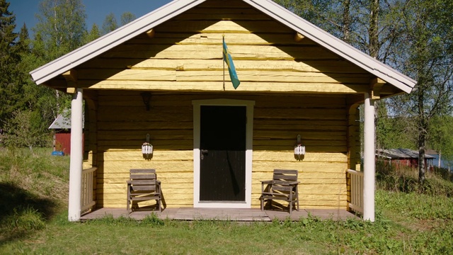 Video Reference: Building, Property, Plant, Shade, Tree, Wood, Land lot, Cottage, House, Grass