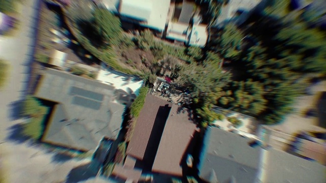 Video Reference: Motor vehicle, Road surface, Asphalt, Urban design, Tints and shades, Sidewalk, Road, City, Glass, Landscape