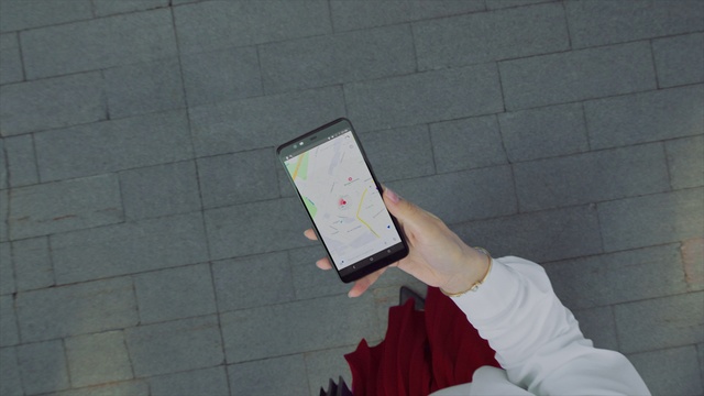 Video Reference: Hand, Gesture, Communication Device, Finger, Mobile phone, Gadget, Portable communications device, Recreation, Mobile device, Flooring