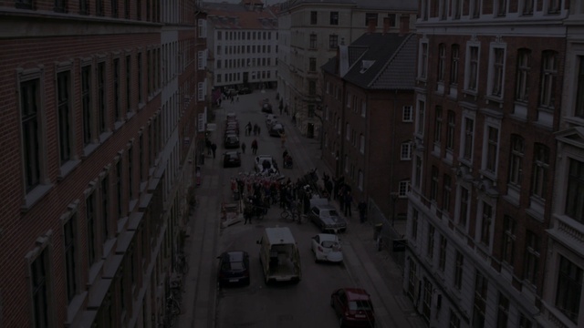 Video Reference: Building, Window, Car, Vehicle, Urban design, Grey, Neighbourhood, Road surface, Thoroughfare, Landmark