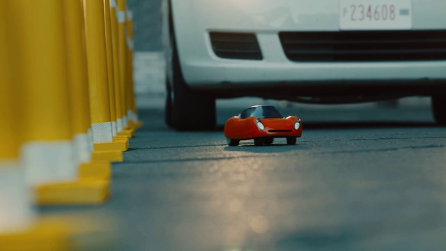 Video Reference: Tire, Car, Vehicle, Wheel, Hood, Automotive lighting, Automotive design, Motor vehicle, Orange, Asphalt