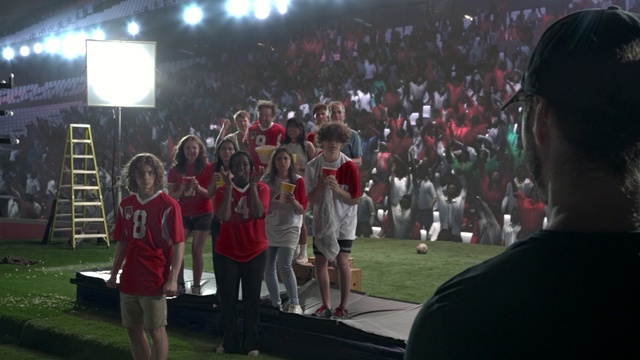 Video Reference: Shorts, Entertainment, T-shirt, Leisure, Grass, Fan, Fun, Event, Crowd, Competition event