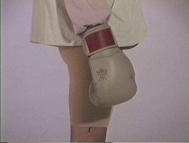 Video Reference: Glove, Bag, Sleeve, Waist, Collar, Blazer, Street fashion, Fashion design, Wrist, Trunk