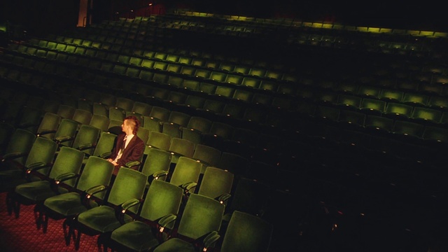 Video Reference: Chair, Event, Entertainment, Performing arts center, Sport venue, Audience, Darkness, Arena, Night, Auditorium