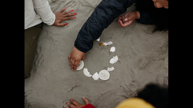 Video Reference: Hand, Shoe, White, Leg, Finger, Gesture, Thumb, Road surface, Flooring, Nail