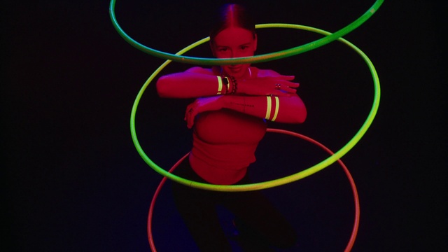 Video Reference: Human body, Entertainment, Red, Magenta, Visual effect lighting, Art, Performing arts, Neon, Electricity, Fictional character