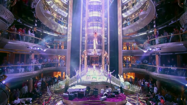 Video Reference: Building, Purple, Light, Architecture, Entertainment, City, Metropolitan area, Landmark, Metropolis, Stage