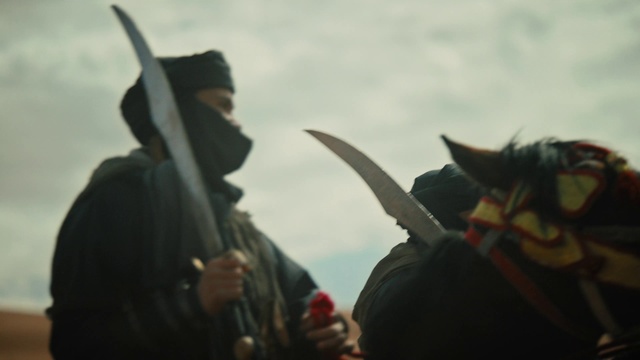 Video Reference: Sky, Cloud, Event, Tradition, Carmine, Fictional character, History, Hat, Armour, Costume