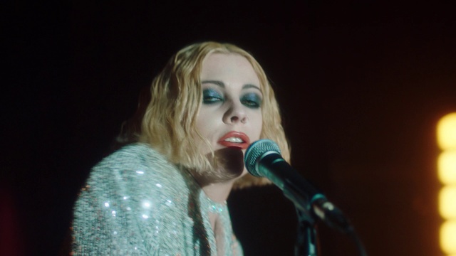 Video Reference: Microphone, Lip, Musician, Human body, Concert, Music, Eyelash, Performing arts, Music artist, Audio equipment