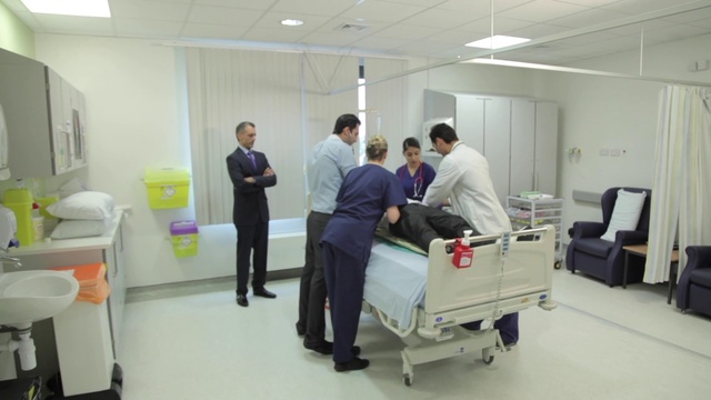 Video Reference: Wheel, Coat, Service, Building, Engineering, Medical equipment, Health care, Event, Machine, Job