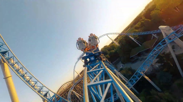 Video Reference: Sky, Leisure, Recreation, Fun, Amusement ride, Chute, Roller coaster, Pole, Nonbuilding structure, Amusement park