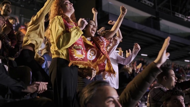 Video Reference: Entertainment, Gesture, Hat, Performing arts, Dance, Crowd, Leisure, Event, Music, Stage