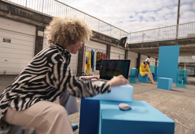 Video Reference: Sky, Cloud, Table, T-shirt, Leisure, Computer monitor, Recreation, Desk, Electric blue, Tree