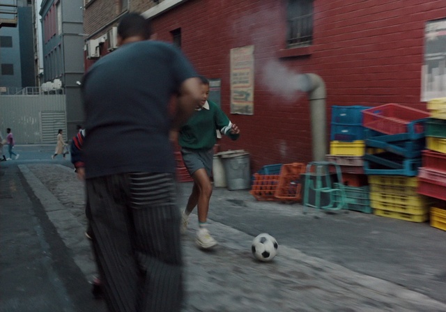 Video Reference: Window, Soccer, Building, Ball, Sports equipment, Shorts, Football, Road surface, Flooring, Asphalt