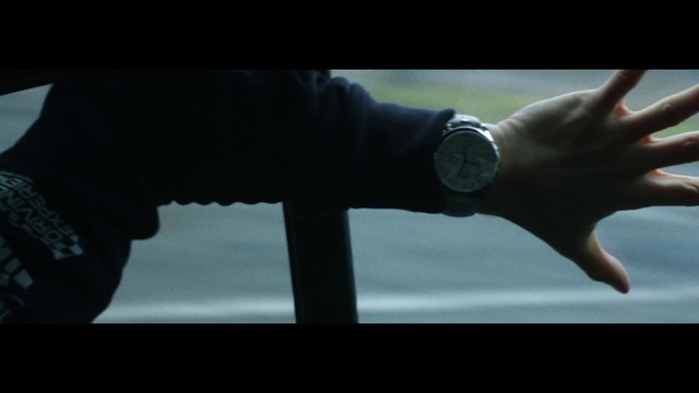 Video Reference: Watch, Hand, Hood, Sleeve, Flash photography, Gesture, Clock, Automotive exterior, Elbow, Automotive design