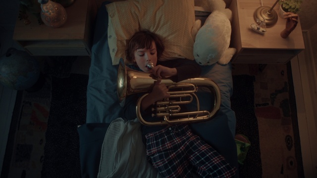 Video Reference: Tartan, Art, Plaid, Musical instrument, Space, Wind instrument, Brass instrument, Music, Personal protective equipment, Darkness