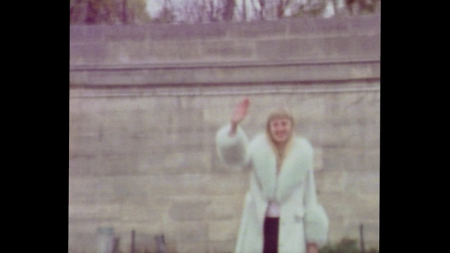 Video Reference: Flash photography, Sleeve, Gesture, Happy, Street fashion, Tints and shades, Formal wear, Vintage clothing, Magenta, Room